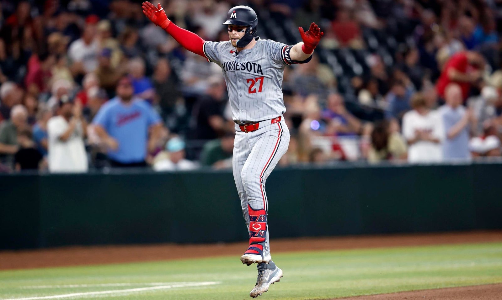 Ryan Jeffers reacts to hitting a home run.