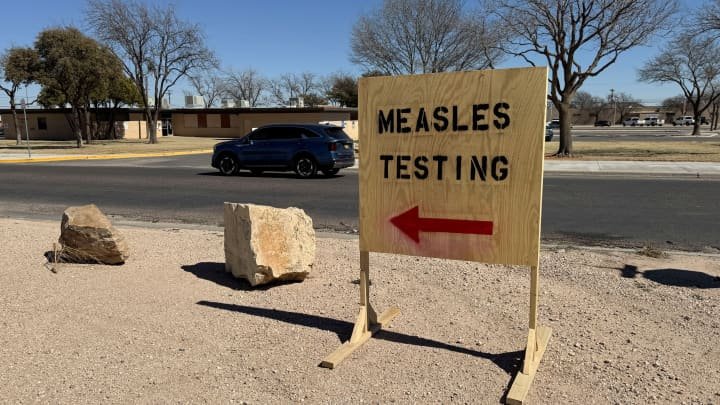 A sign that says "measles testing" is seen during an outbreak in Gaines County, Texas, that has raised concerns over its spread to other parts of the state, in Seminole, Texas, Feb. 25, 2025.