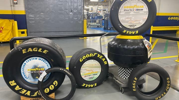 Racing tires displayed inside the factory floors of Goodyear's headquarters in Akron, Ohio, on Feb. 27, 2025.