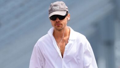 Harry Styles Strolls Into Late Summer in an Enormous White Shirt