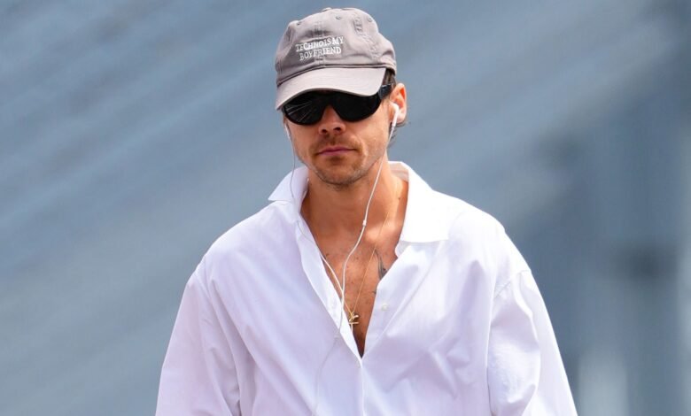Harry Styles Strolls Into Late Summer in an Enormous White Shirt Harry Styles Strolls Into Late Summer in an Enormous White Shirt
