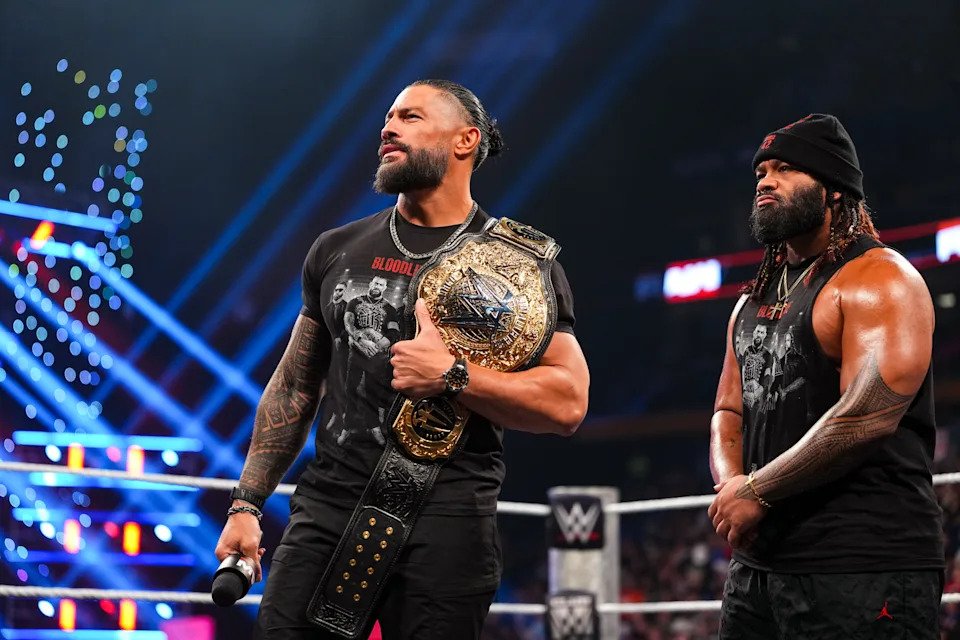 BUFFALO, NEW YORK - AUGUST 17: Roman Reigns and Jacob Fatu enter the ring during Monday Night RAW at KeyBank Center on August 17, 2026 in Buffalo, New York. (Photo by Cooper Neill/WWE via Getty Images)