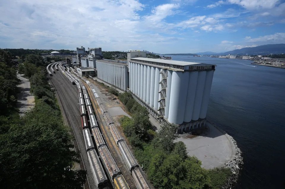 Rail cars are seen on the tracks outside the Viterra Cascadia Terminal that handles grain exports, during a strike by International Longshore and Warehouse Union Canada workers in the province, in Vancouver, on Wednesday, July 12, 2023. THE CANADIAN PRESS/Darryl Dyck