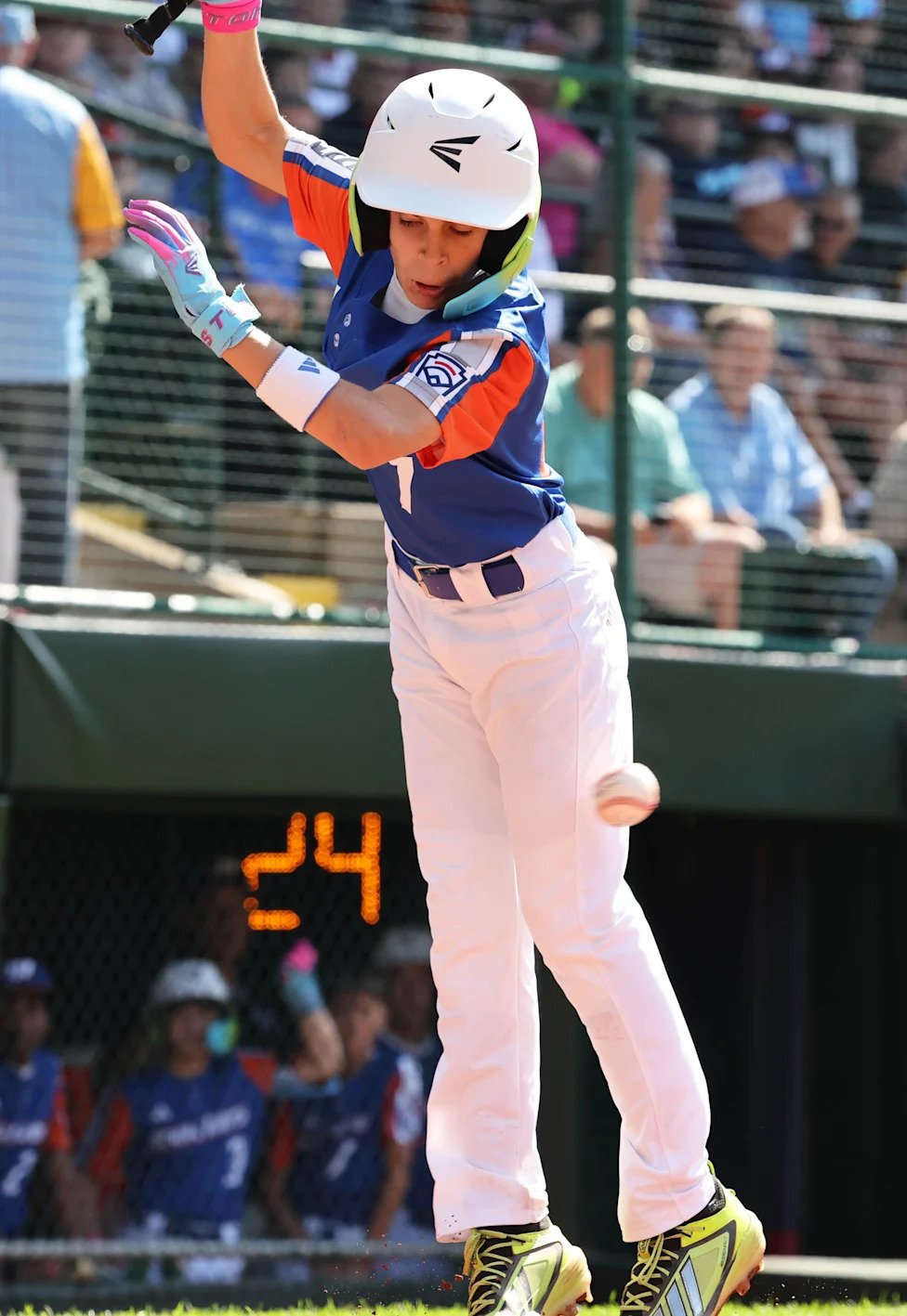 Batter Boone Treadway of Hamilton West Side (Great Lakes region) avoids being hit by a pitch against Henderson, Nevada, (Moun