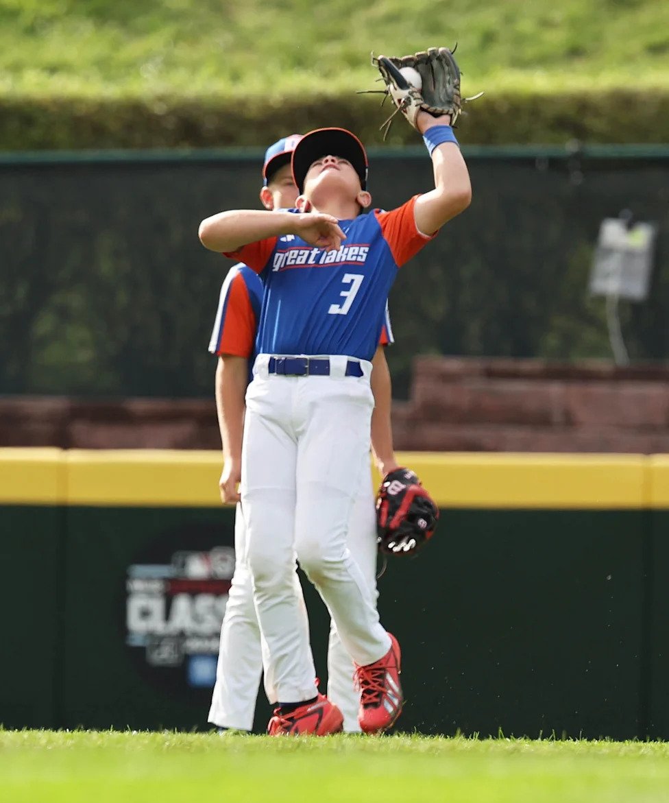 Shortstop Leo Feltner of Hamilton,Ohio (Great Lakes Region) makes the catch against Henderson Nevada, (Mountain Region) at th