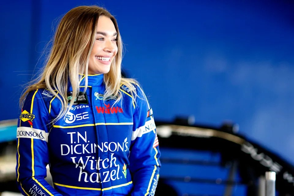 Natalie Decker, driver of the #35 T.N. Dickinson's Witch hazel Chevrolet, looks on in the garage area during practice for the NASCAR O'Reilly Auto Parts Series United Rentals 300 at Daytona International Speedway on February 13, 2026 in Daytona Beach, Florida.