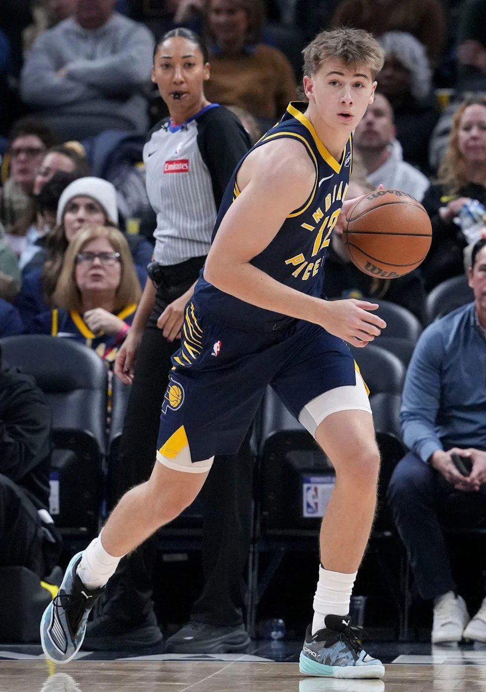 Indiana Pacers guard Johnny Furphy (12) looks to pass during the first half of a game against the Denver Nuggets on Wednesday