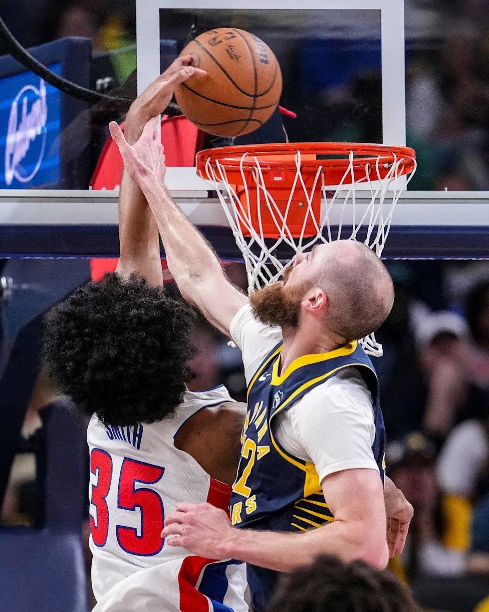 Indiana Pacers center Jay Huff (32) attempts to stop Detroit Pistons forward Tolu Smith (35) on Sunday, April 12, 2026, durin