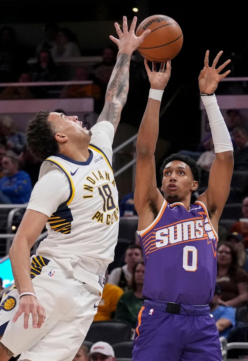 Indiana Pacers forward Jalen Slawson (18) defends Phoenix Suns forward Ryan Dunn (0) as he shoots the ball during a game Thur