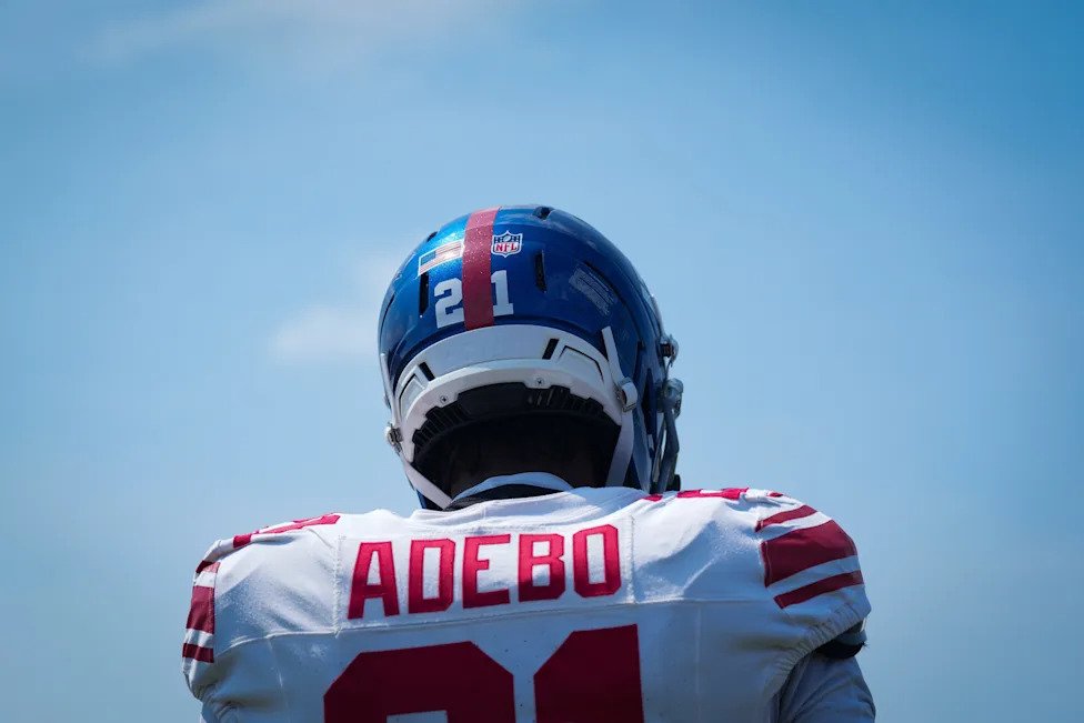 New York Giants cornerback Paulson Adebo (21) looks on while at Quest Diagnostics Training Center, Aug 10, 2026, East Rutherf