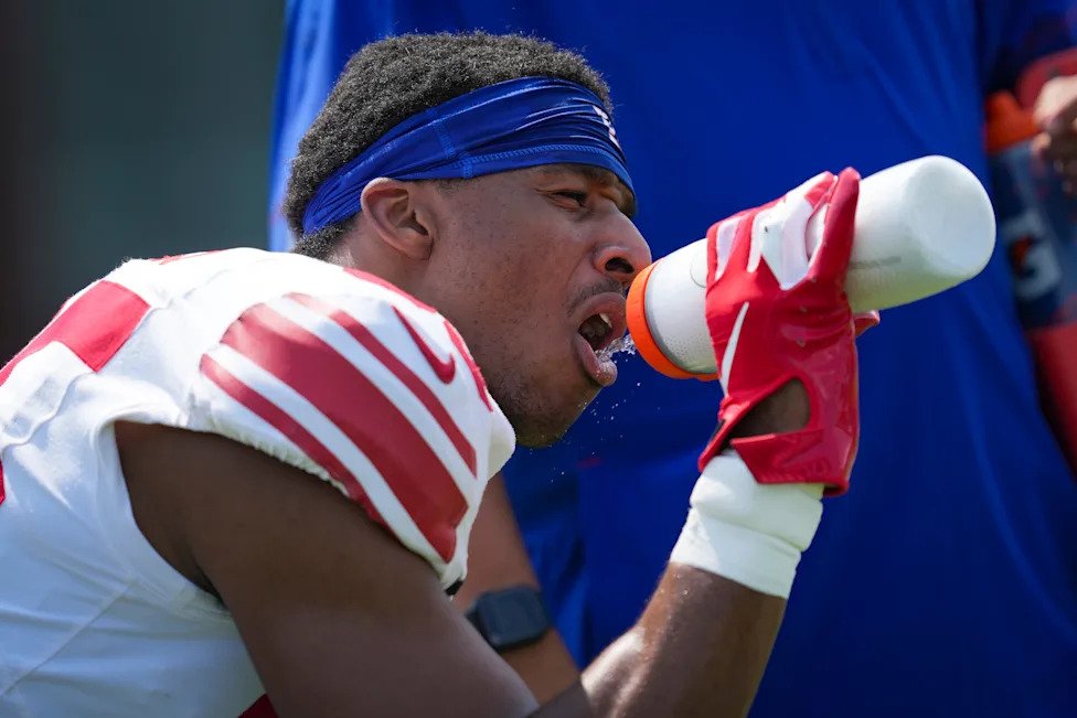 New York Giants defensive back JT Woods (35) drinks water while training at Quest Diagnostics Training Center, Aug 10, 2026,