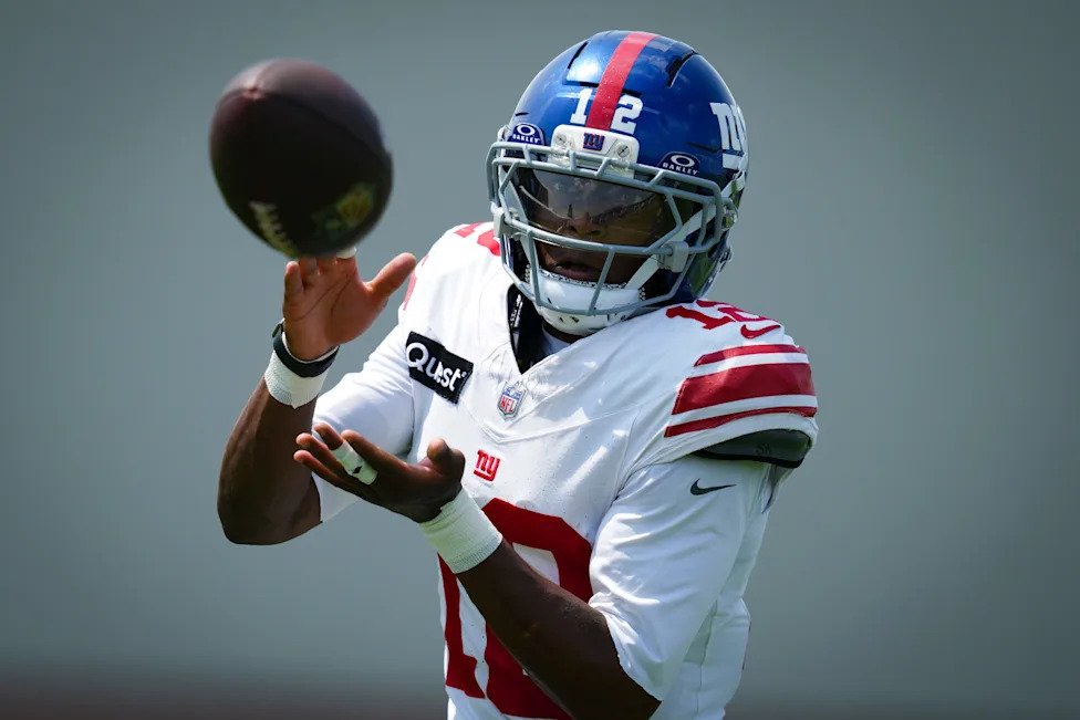 New York Giants cornerback Colton Hood (12) catches the ball while training at Quest Diagnostics Training Center, Aug 10, 202
