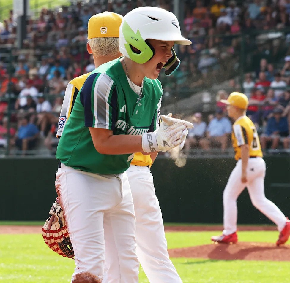 Kasen Workman of Tacoma, WA (Northwest Region) hits a triple in the seventh inning scoring two runs against Phenix, AL (South