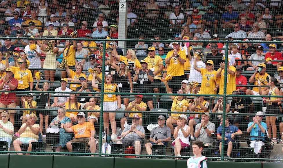 Family and friends of Phenix, AL (Southeast Region) cheer for their team against Tacoma, WA (Northwest Region) at the Little 