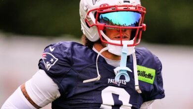 Gonzalez focused on season, but irked by talks with Patriots