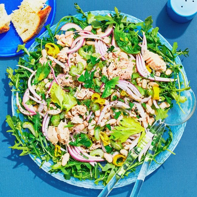 Sliced red onions oilpacked tuna celery stalks cannellini and Pepperoncini peppers tossed in a dressing of olive oil...