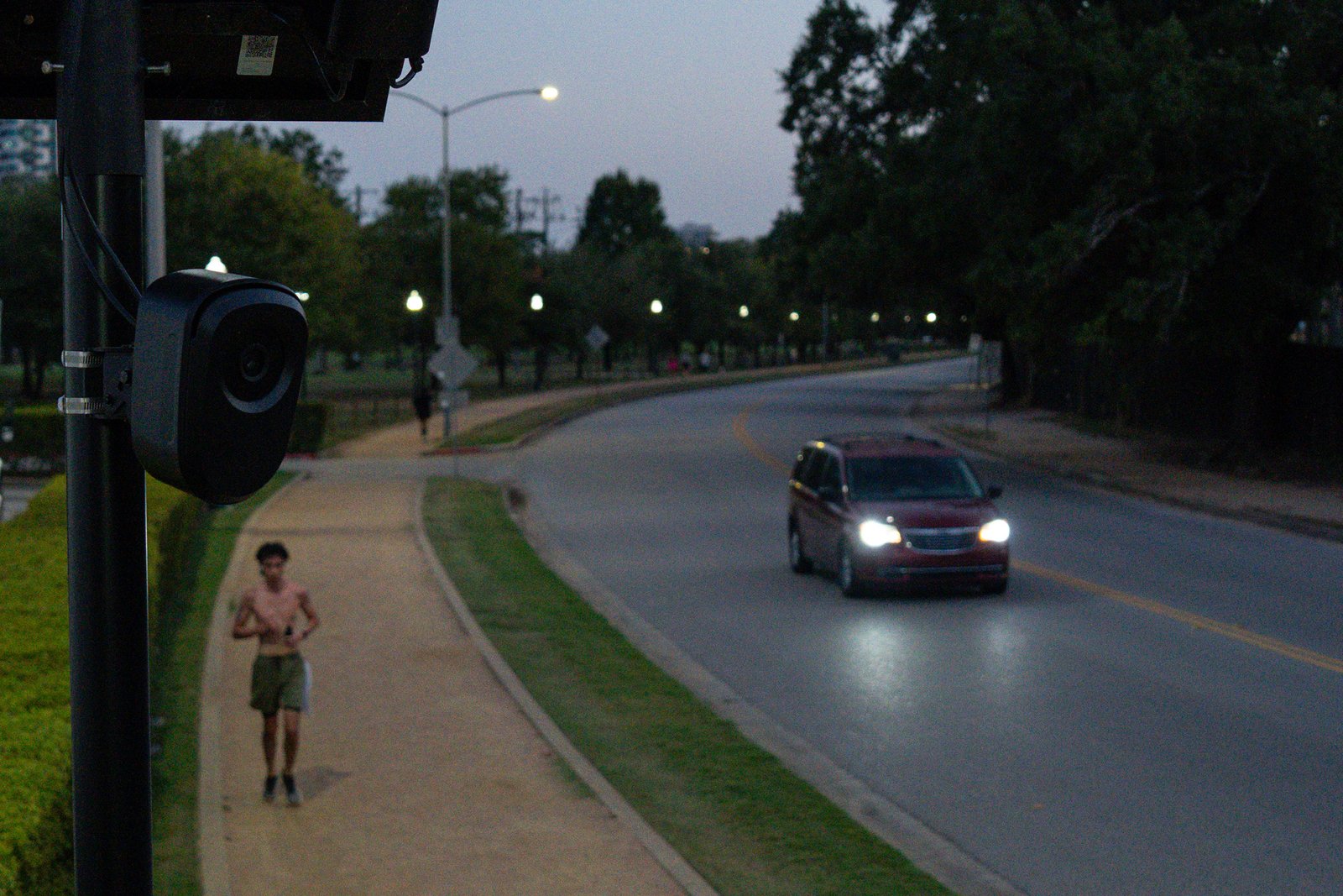 A Flock camera records as a car drives through Hermann Park near the Houston Zoo on Sunday, Aug. 23, 2026.