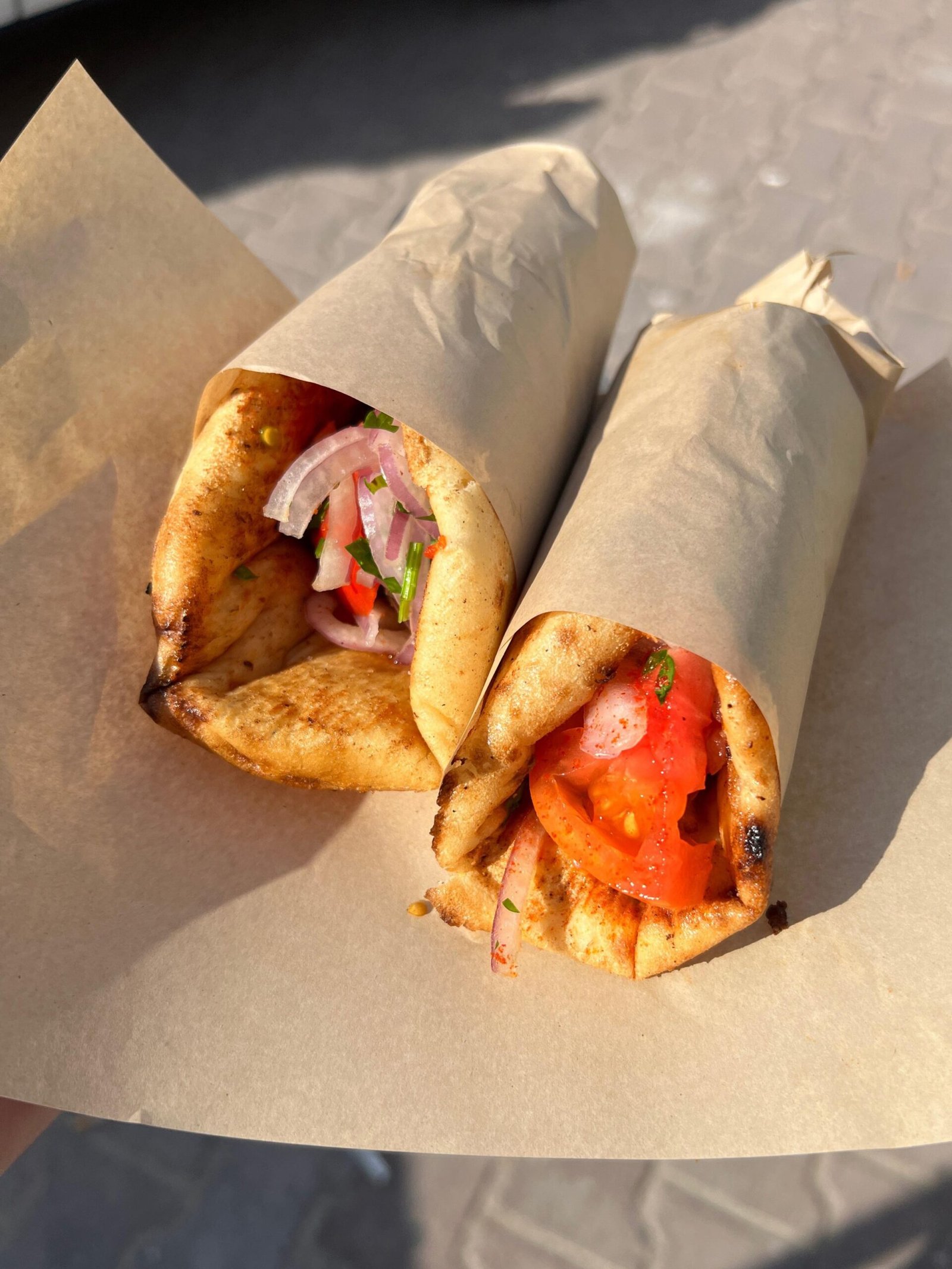 Two bifteki in pita make for the perfect lunch on the way to the ferry.