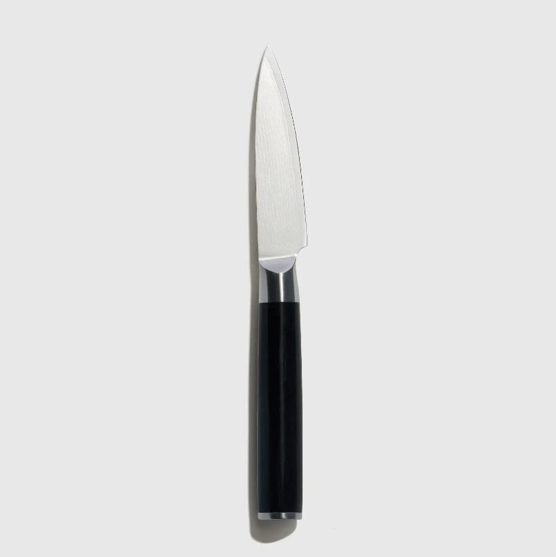 A black handled small paring knife.