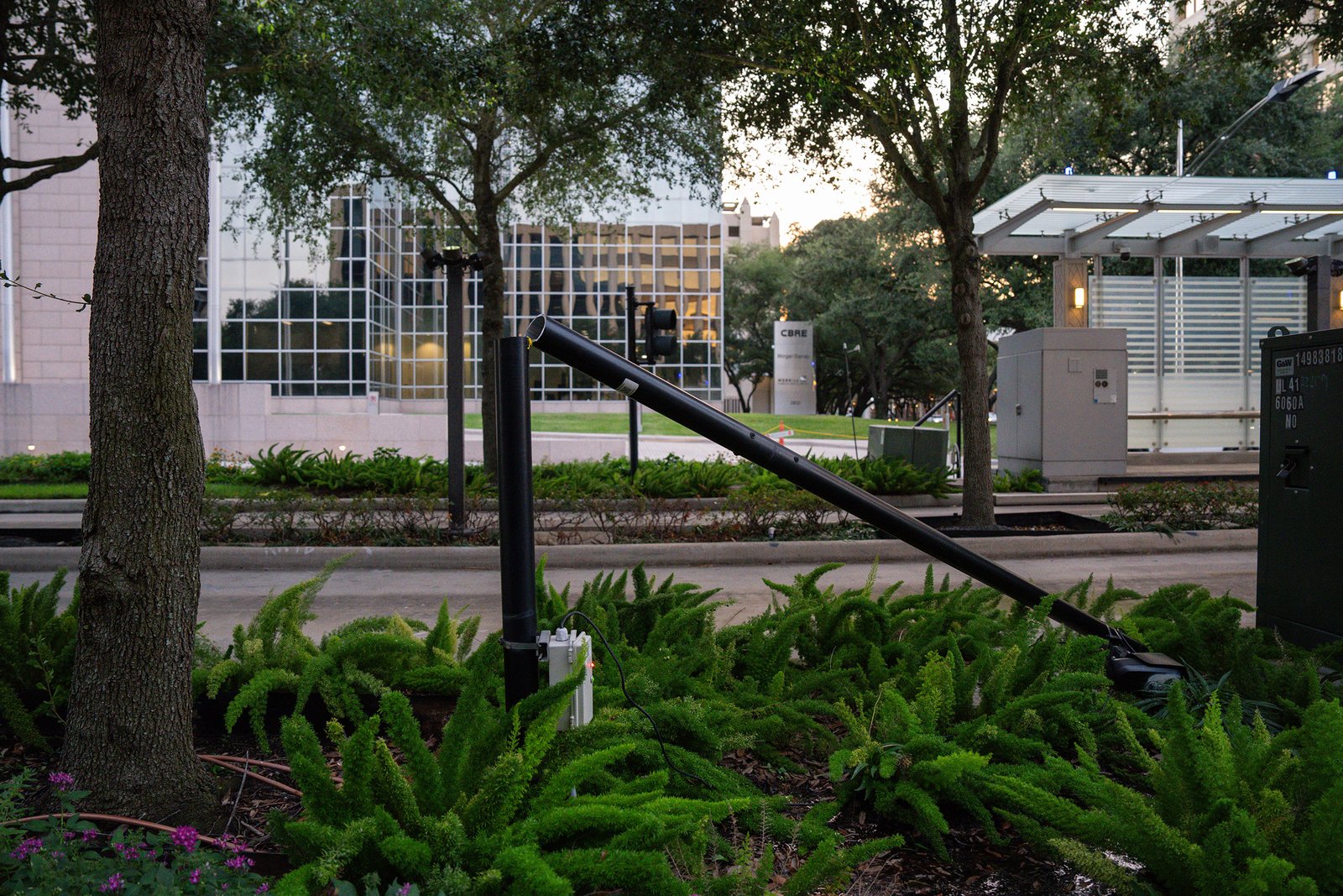 Destroyed Flock cameras are seen along Post Oak Boulevard near the Williams Tower and the Gerald D. Hines Waterwall Park in H
