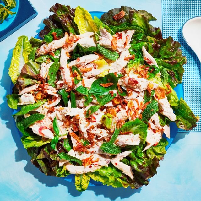 Shredded chicken breasts tossed in nuoc cham made from lime juice fish sauce minced shallot mayonnaise garlic and bird's...