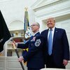Trump, Unveiling Space Force Flag, Touts What He Calls New 'Super-Duper Missile'