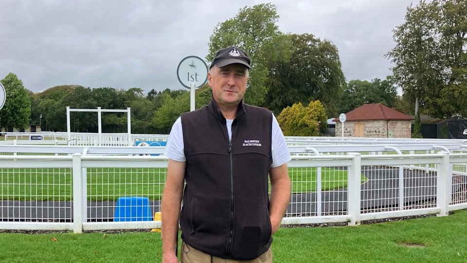 Jeremy Martin stands in front of the paddock at Salisbury racecourse