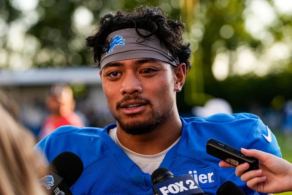 Detroit Lions running back Sione Vaki (33) speaks to media members after practice during training camp at Meijer Performance Center in Allen Park on Monday August 17, 2026.