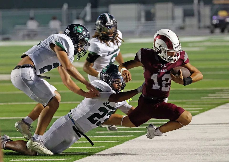 Marshall Rams Angelo Cantu #12 is forced out of bunds In the first half on Thursday, Sept. 3, 2026 at Gustafson Stadium. (Ron