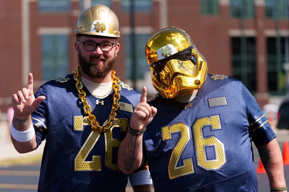 Braden Sparks, left, and James Taylor, both from Kokomo, IN, pose for a photo before a NCAA football game between Notre Dame 