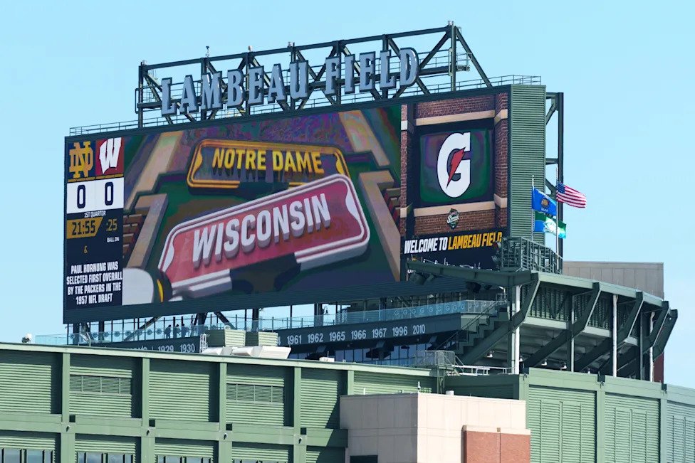 The video board at Lambeau Field advertises the NCAA football game between Notre Dame and Wisconsin on Sunday, Sept. 6, 2026,