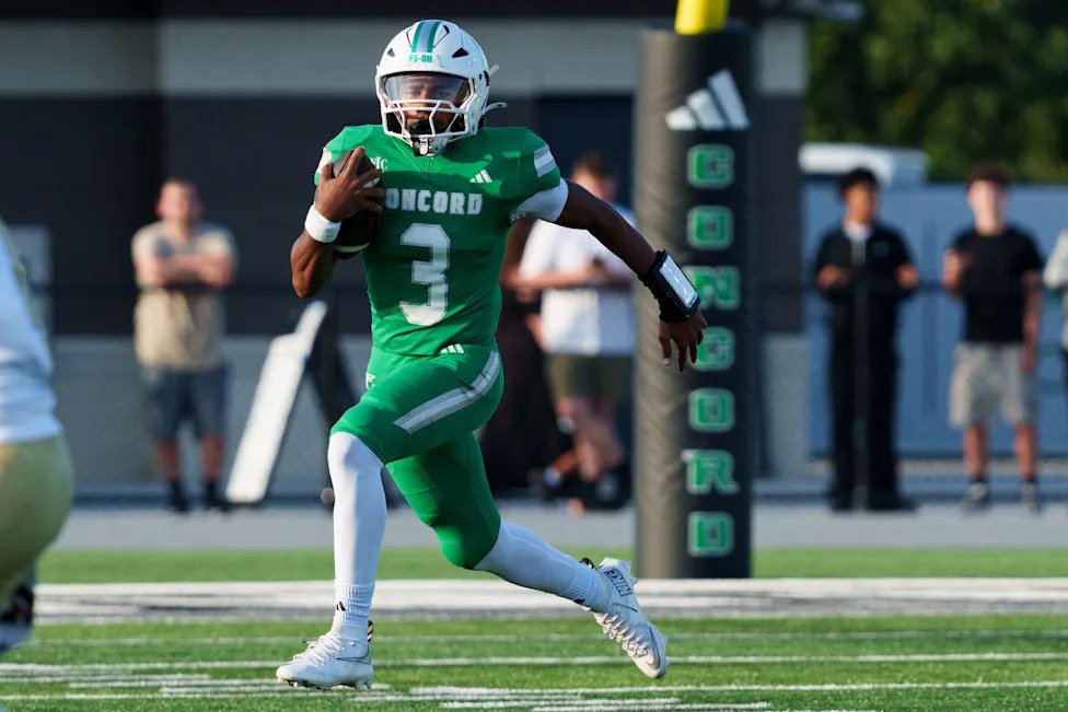Concord's Braylon Monroe runs the ball during an IHSAA football game between Concord and Elkhart at Concord High School on Fr