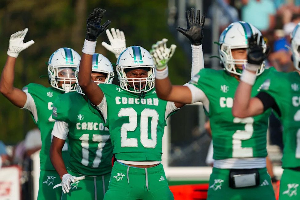 Concord prepares to kick the ball to Elkhart during an IHSAA football game between Concord and Elkhart at Concord High School