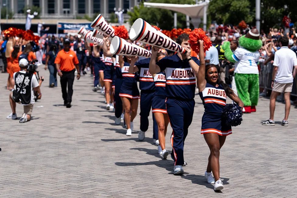 Auburn Tigers cheerleaders greet fans during Tiger Walk before Auburn Tigers take on Baylor Bears in the Aflac Kickoff Game a