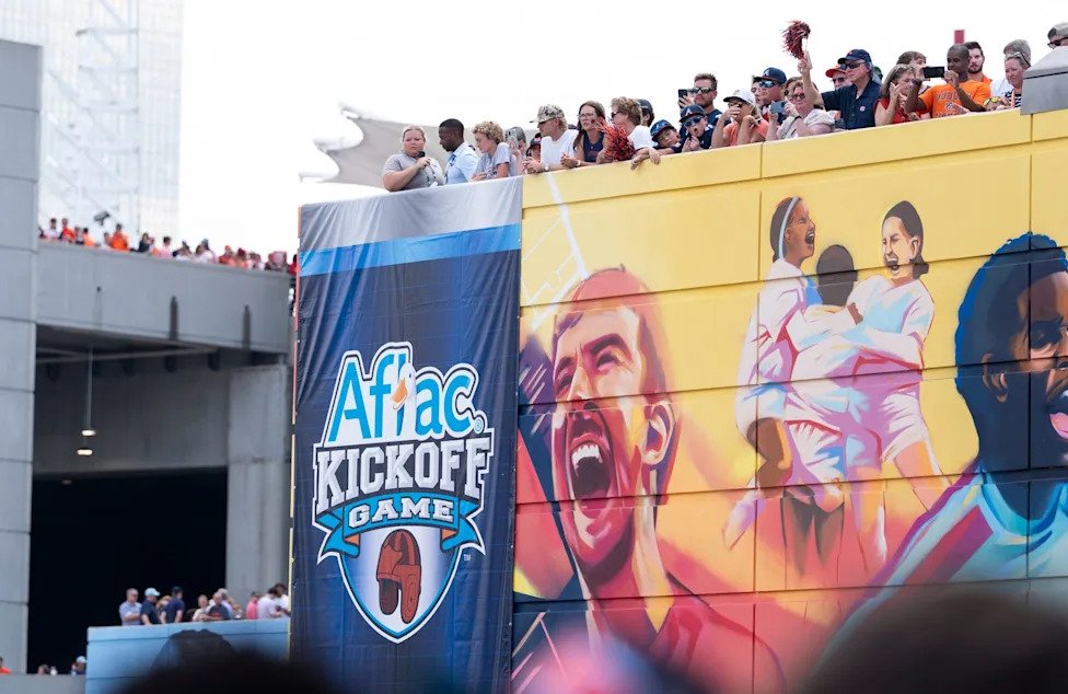 Auburn Tigers fans cheer on their team before Auburn Tigers take on Baylor Bears in the Aflac Kickoff Game at Mercedes-Benz S