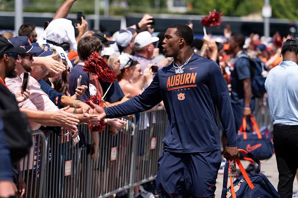 Auburn Tigers edge Da'Shawn Womack (15) greets fans during Tiger Walk before Auburn Tigers take on Baylor Bears in the Aflac 