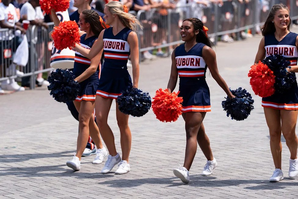 Auburn Tigers cheerleaders greet fans before Auburn Tigers take on Baylor Bears in the Aflac Kickoff Game at Mercedes-Benz St