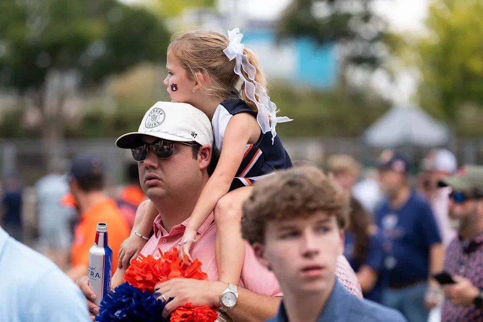 Fans make their way to the game before Auburn Tigers take on Baylor Bears in the Aflac Kickoff Game at Mercedes-Benz Stadium 