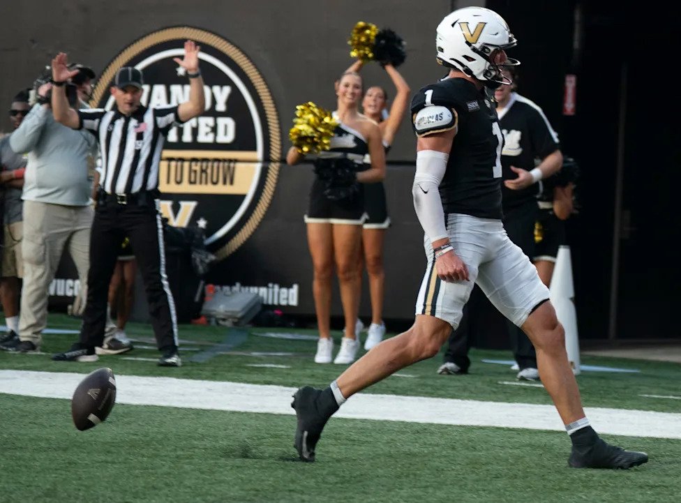 Vanderbilt quarterback Blaze Berlowitz (1) celebrates his running touchdown against Austin Peay during their game at FirstBan