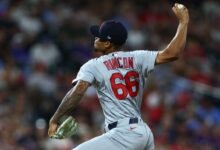 Cardinals manager ejected after rookie told to straighten hat