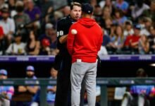 Cards, Rockies tilt caps in protest against ump, ‘power