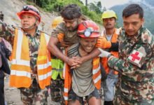 2 trapped workers rescued from a hydropower tunnel 9 days after Nepal floods