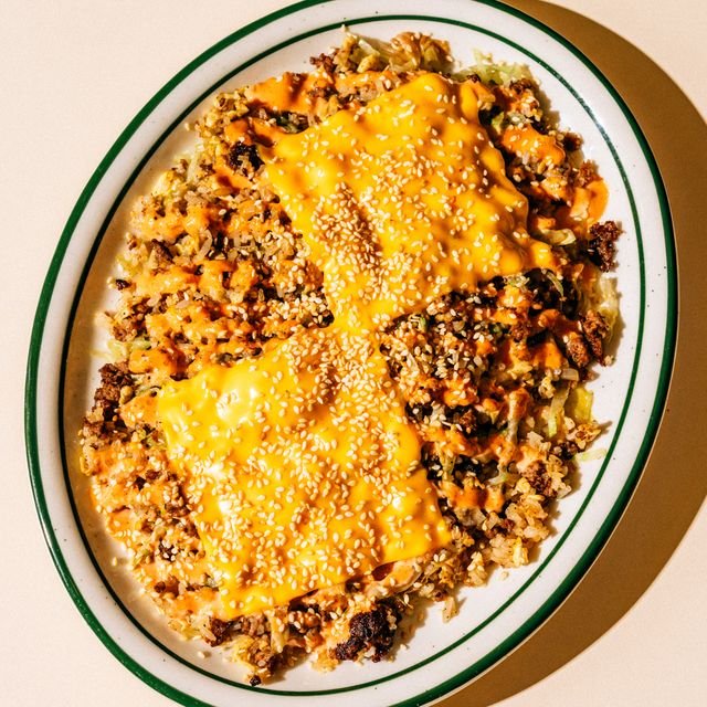 A top view of fresh fried rice on a restaurant table.