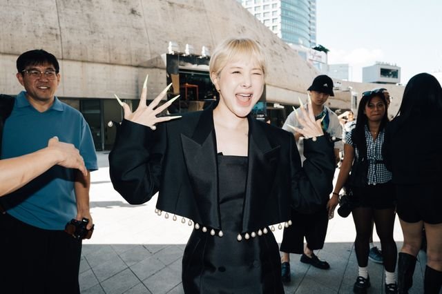 Image may contain Seo Inyoung Blonde Hair Person Blazer Clothing Coat Jacket Head Face Adult Happy and Smile