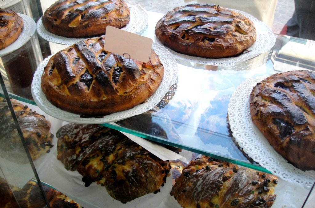 Cakes in a pastry case.
